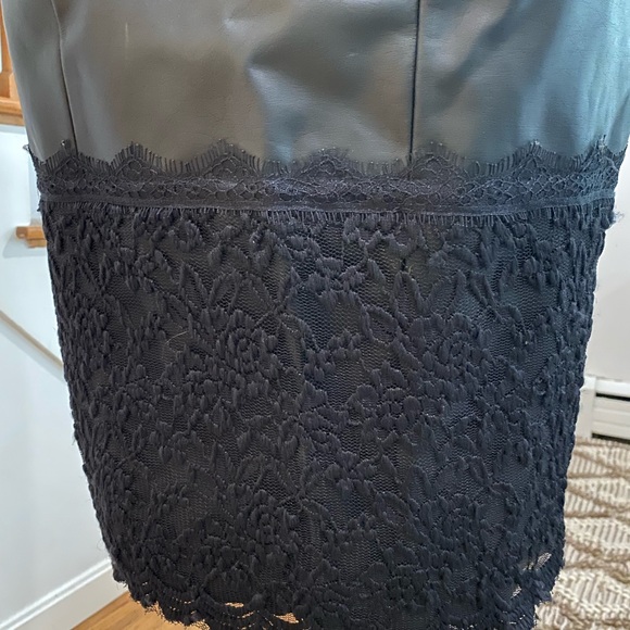 Black form fitting, sexy.  Lacy top and bottom.  Leather look. - Picture 2 of 4